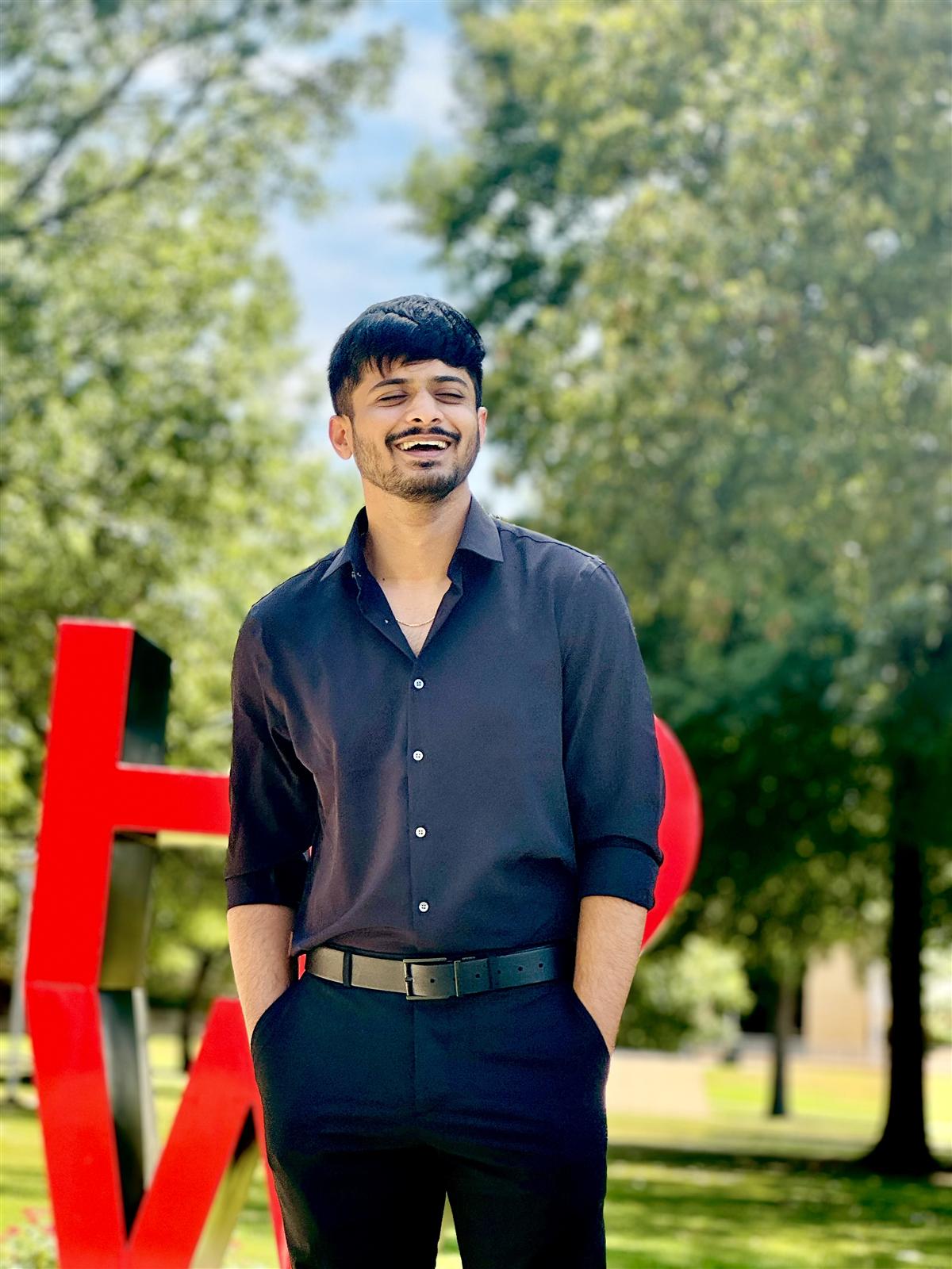 Akash Reddy (V Akash Reddy), candid outdoor portrait, smiling